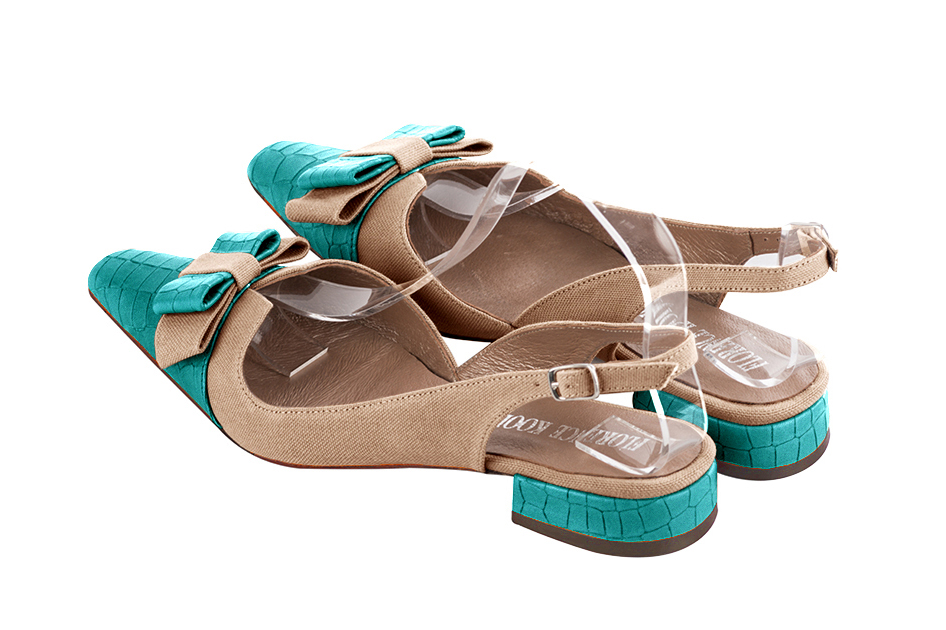 French elegance and refinement for these turquoise blue and tan beige dress slingback shoes, with a knot, 
                available in many subtle leather and colour combinations. The pretty French spirit of this beautiful pump will accompany your steps nicely and comfortably.
To be personalized or not, with your materials and colors.  
                Matching clutches for parties, ceremonies and weddings.   
                You can customize these shoes to perfectly match your tastes or needs, and have a unique model.  
                Choice of leathers, colours, knots and heels. 
                Wide range of materials and shades carefully chosen.  
                Rich collection of flat, low, mid and high heels.  
                Small and large shoe sizes - Florence KOOIJMAN